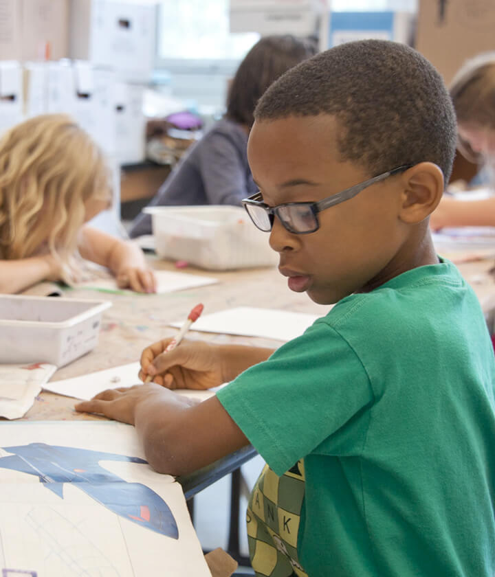 Child working on art project